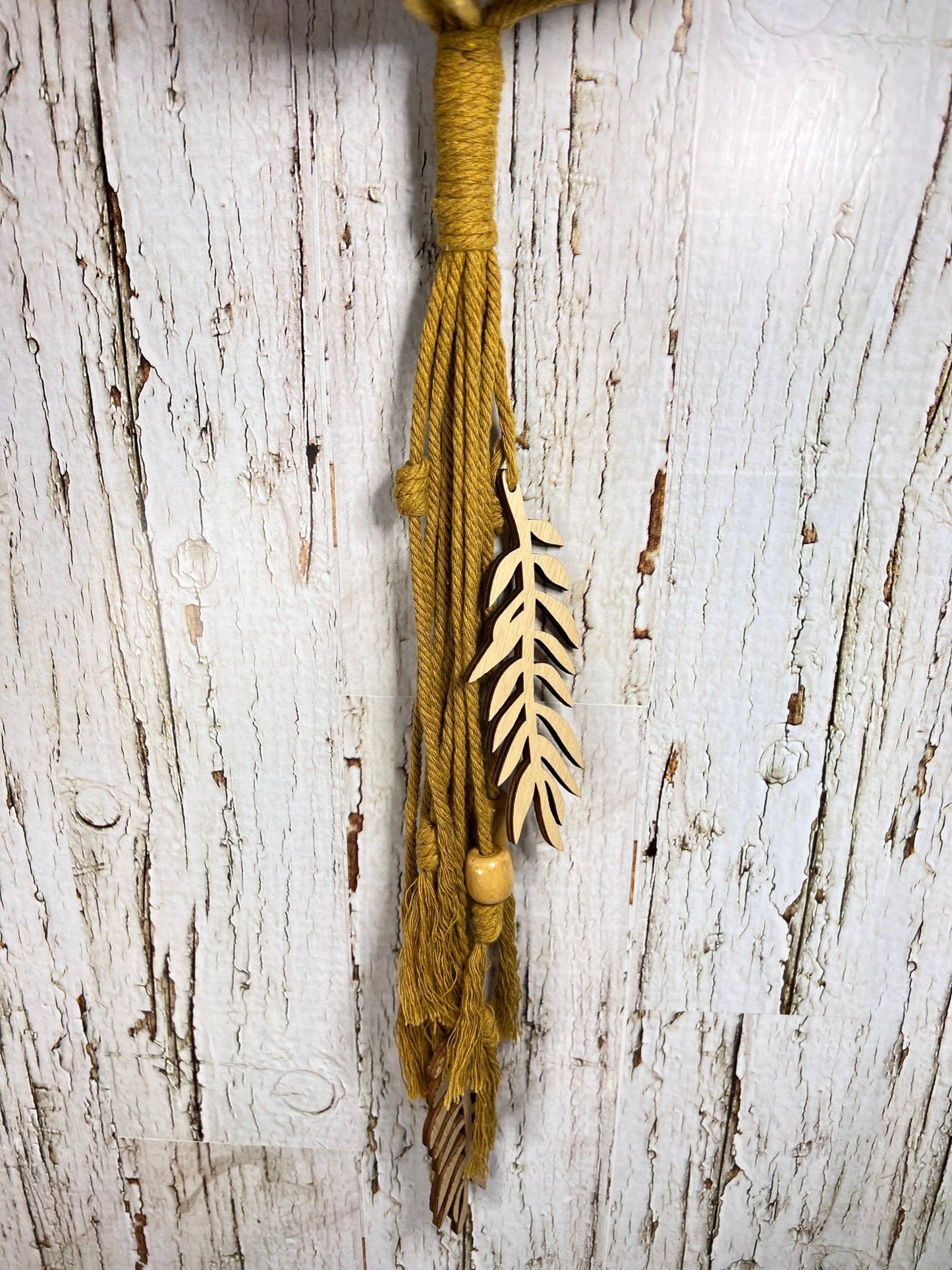 Gold Plant Hanger with Wood Leave Tassel - Naturenspires
